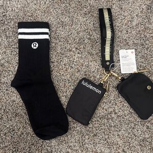 lululemon black gold dual pouch wristlet + black daily essential crew socks